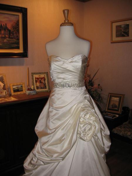 Wedding dress alterations, over bustle by Bridal Alterations by Ruth